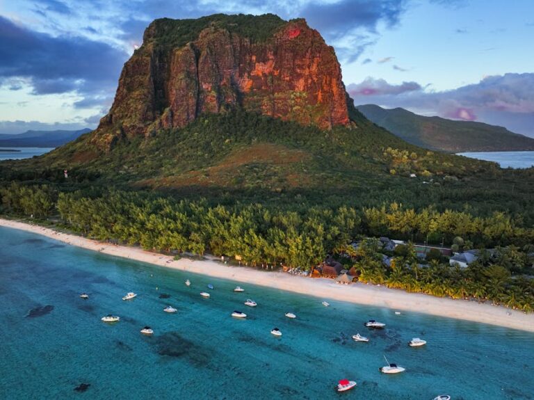 Stunning aerial view showcasing Le Morne Brabant with surrounding beach and boats in Mauritius.